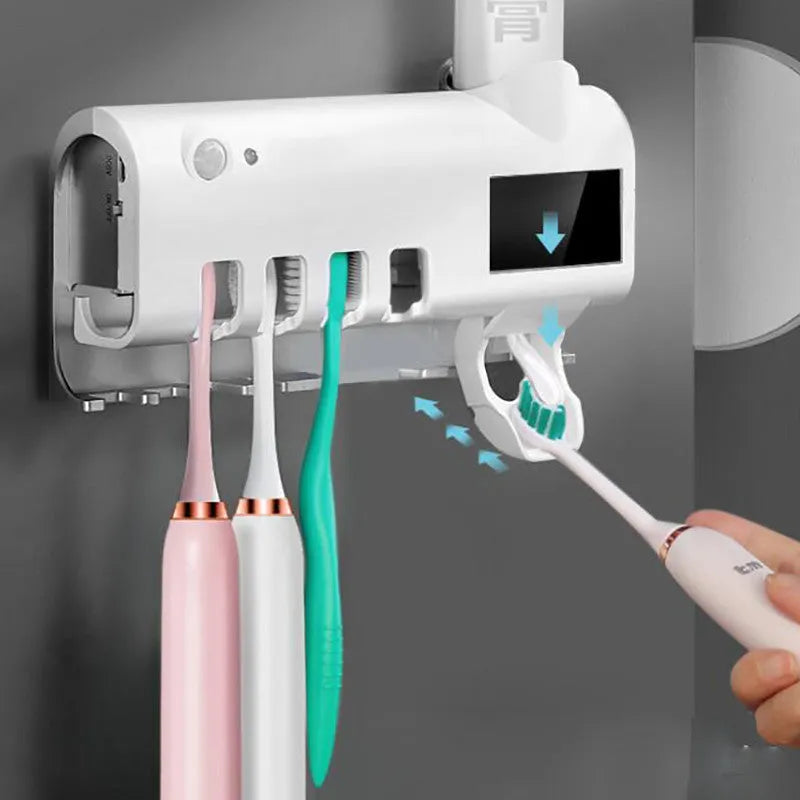 Black intelligent UV toothbrush steriliser with automatic toothpaste squeezer mounted on bathroom wall