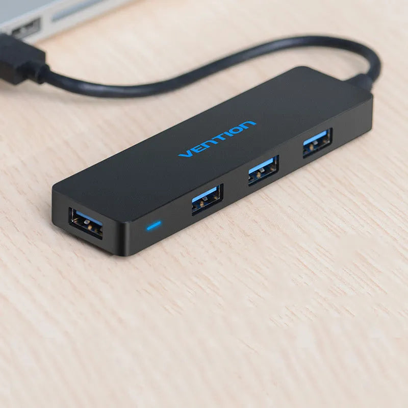 Black four-port USB 3.0 hub with GL 3510 chip and shielded cable