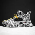 Men's black camouflage high-top basketball shoe with a rubber sole.