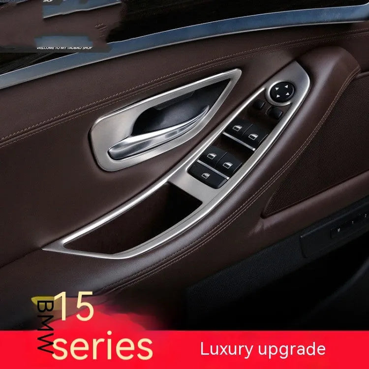 Four silver and black decorative trim strips for BMW 5 Series F10 model interior door handles.