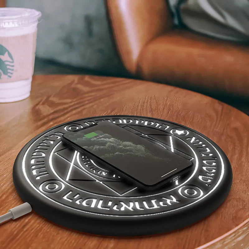 Square wireless phone charger with glowing magic array pattern showing 10W fast charging capability