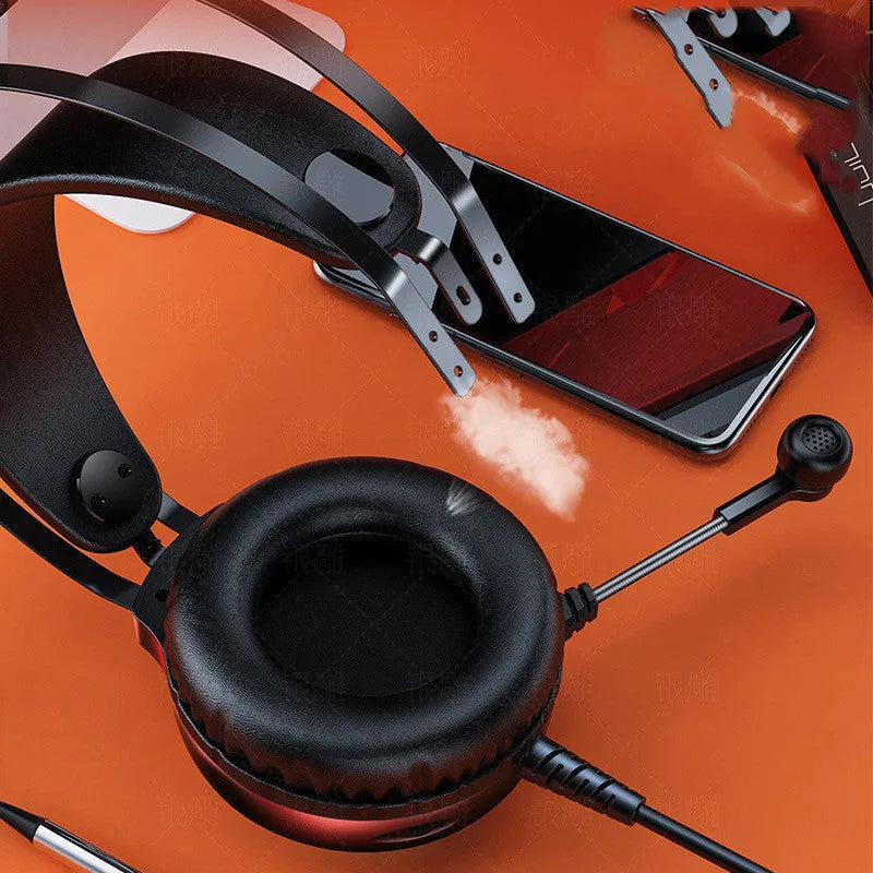 Wired PC headset with black protein earmuffs and 2.39-metre cable connected to 3.5mm plug