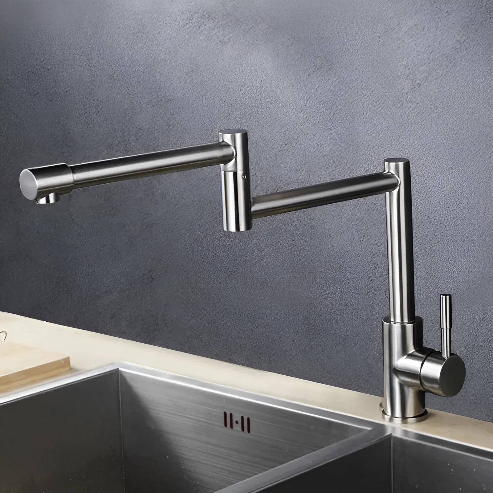 Silver stainless steel dual-handle rotating faucet with 360-degree swivel capability
