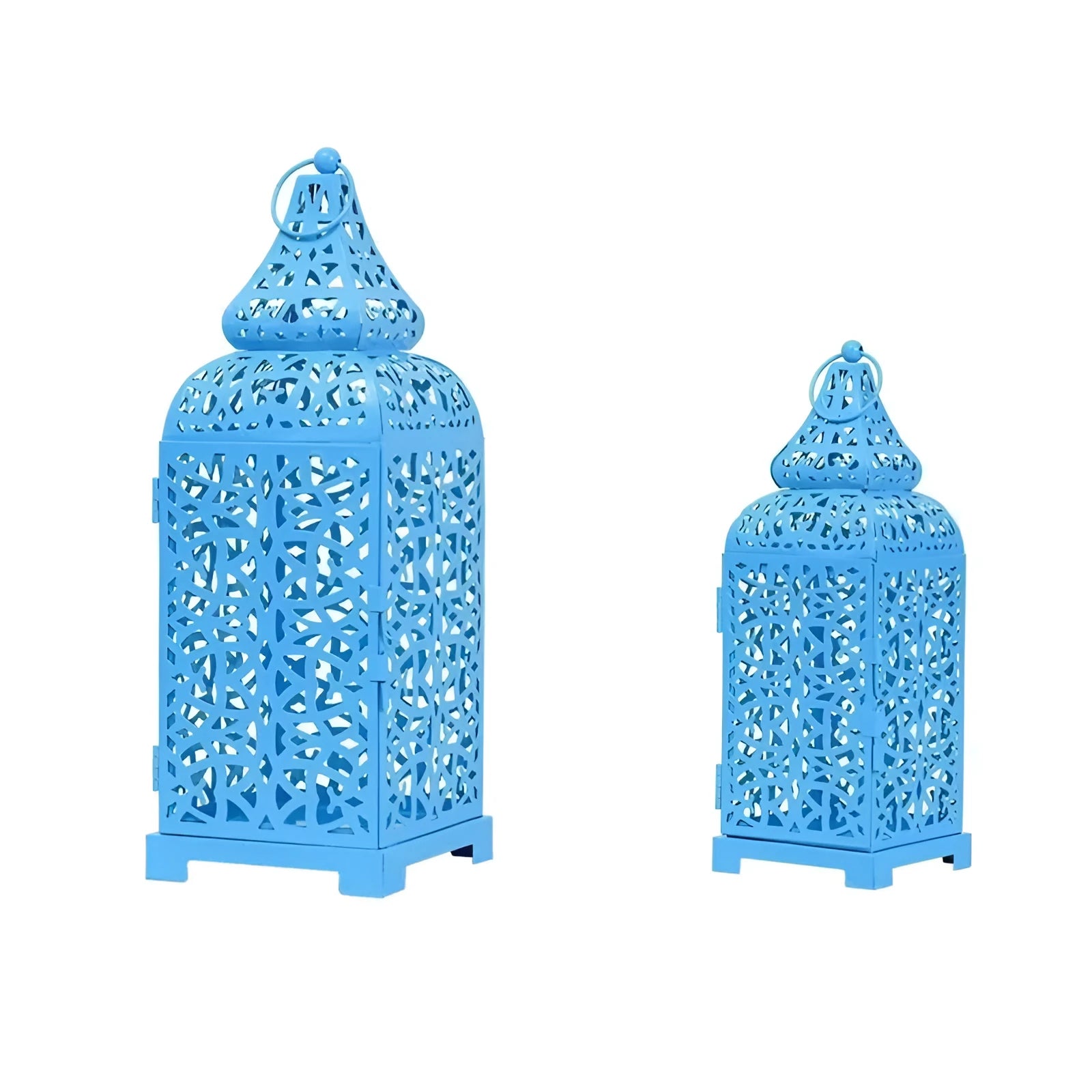 Blue geometric iron Moroccan lantern candlestick on a table.