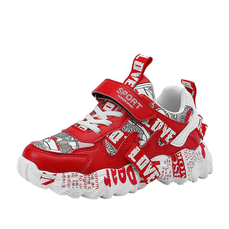 Boys' blue and beige Velcro sports sneakers with a rubber sole on a white background.
