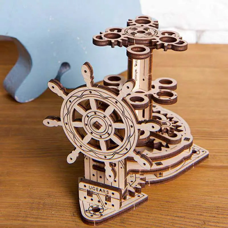 Ukrainian wooden rotating pen holder with steering wheel mechanism and machinery detailing