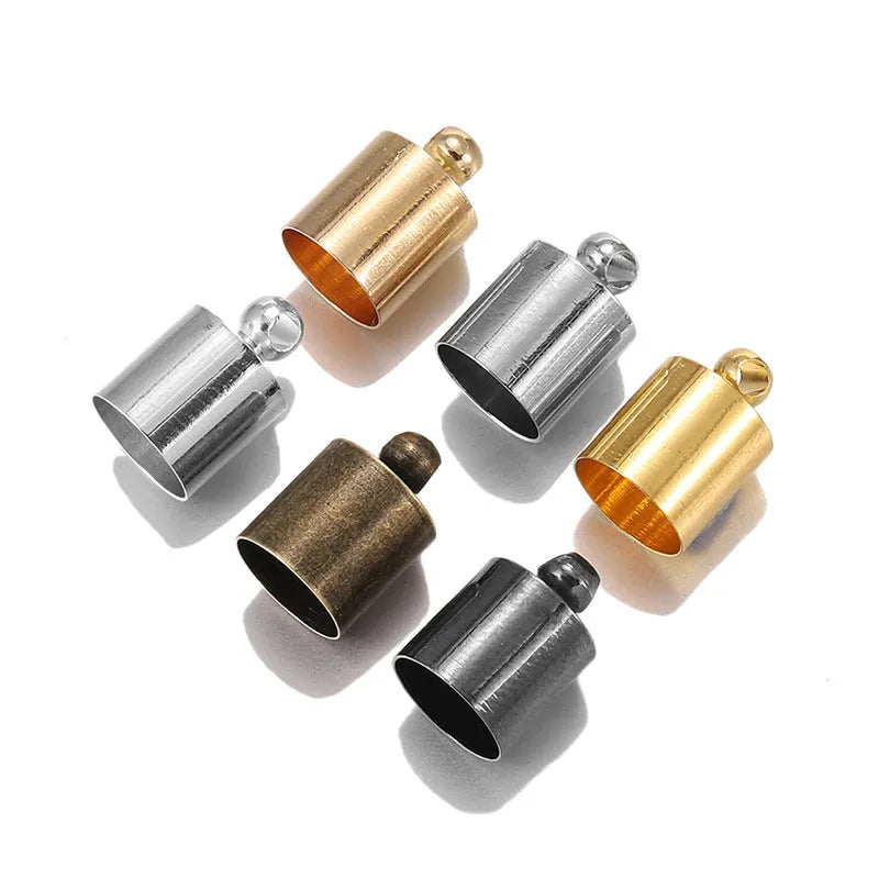 Assorted copper weight caps in different sizes and metallic colours for jewellery making.