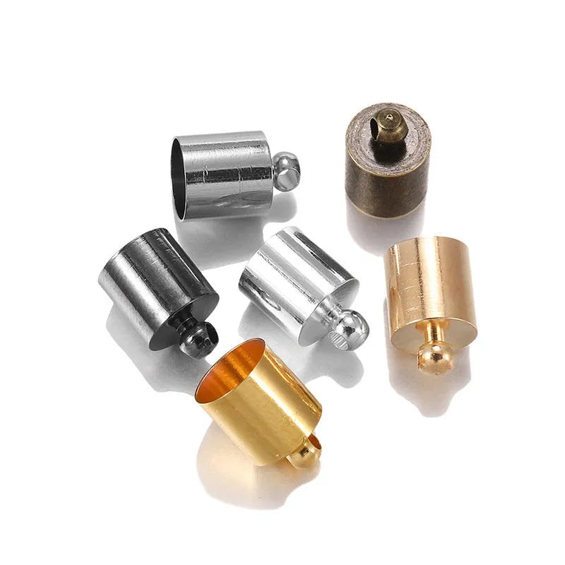 Assorted copper weight caps in different sizes and metallic colours for jewellery making.