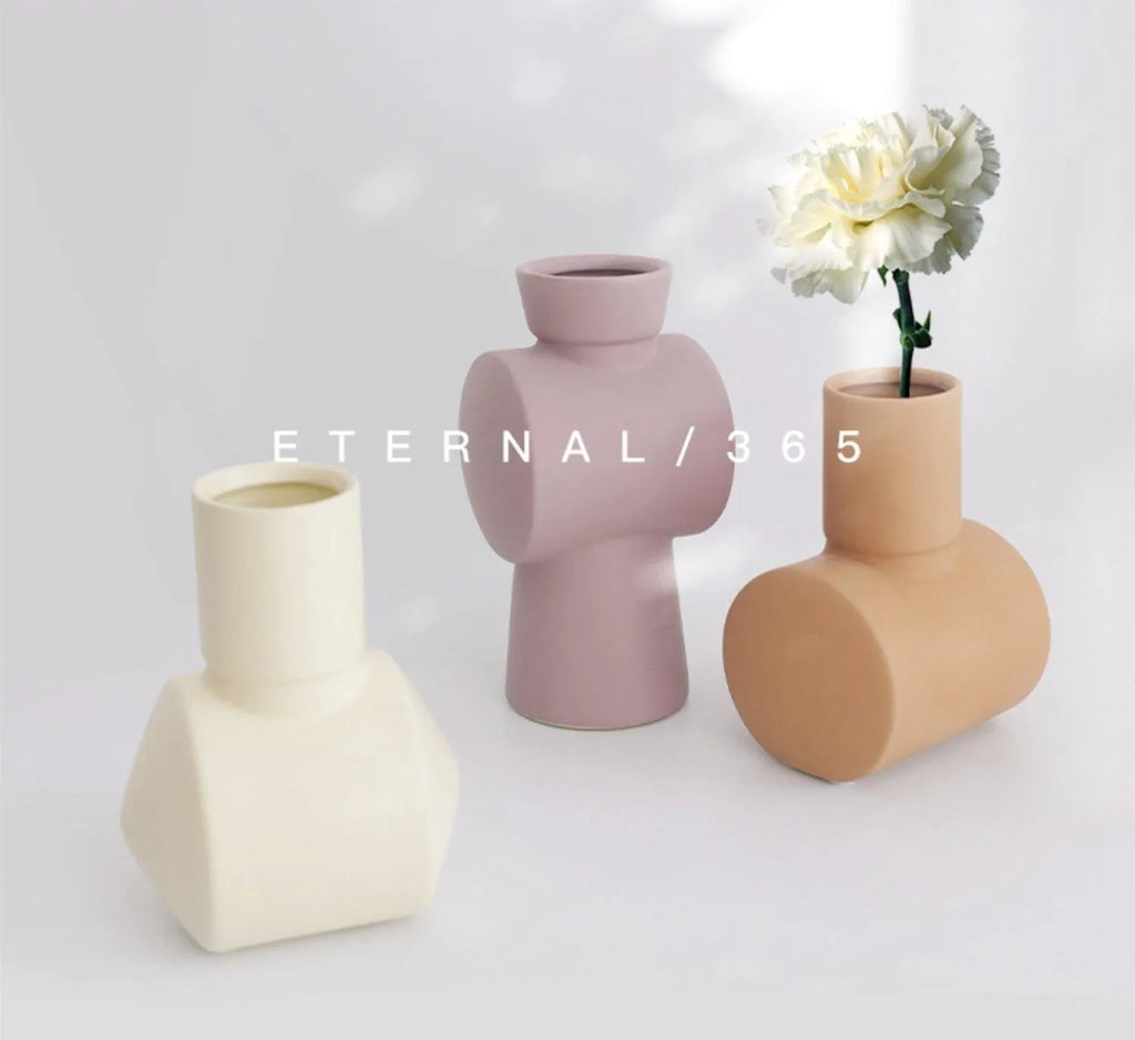 Nordic Morandi colour glaze ceramic vase in beige, brown or purple for home decoration.