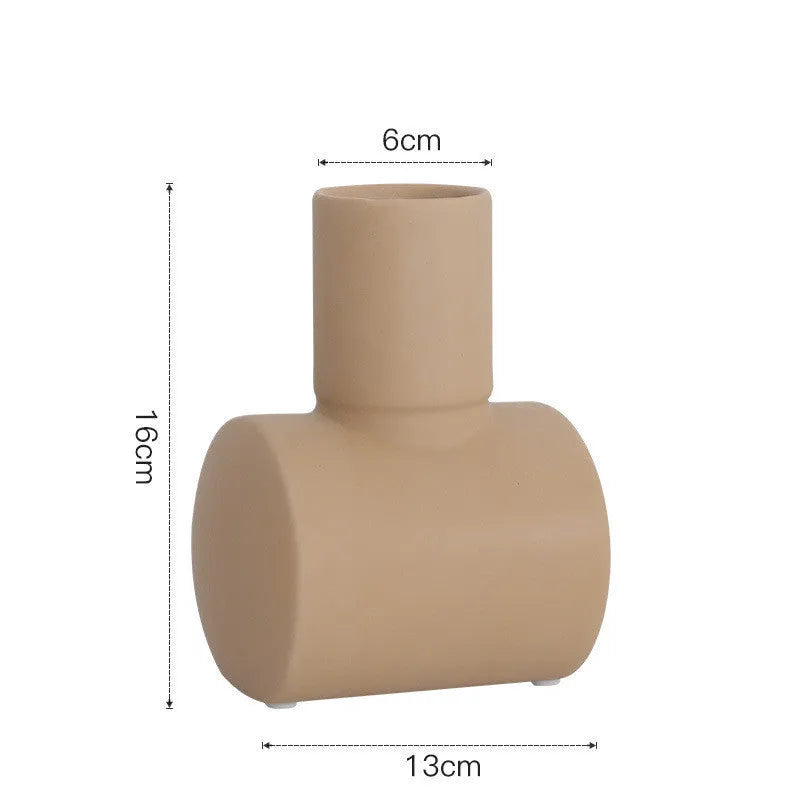 Nordic Morandi colour glaze ceramic vase in beige, brown or purple for home decoration.