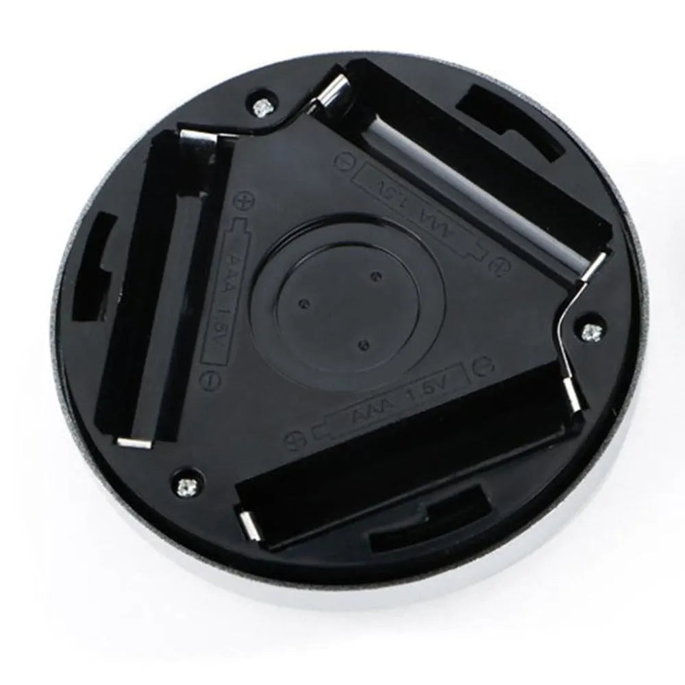 Silver square wireless motion sensor night light on a surface, showing its compact 80mm x 80mm size.