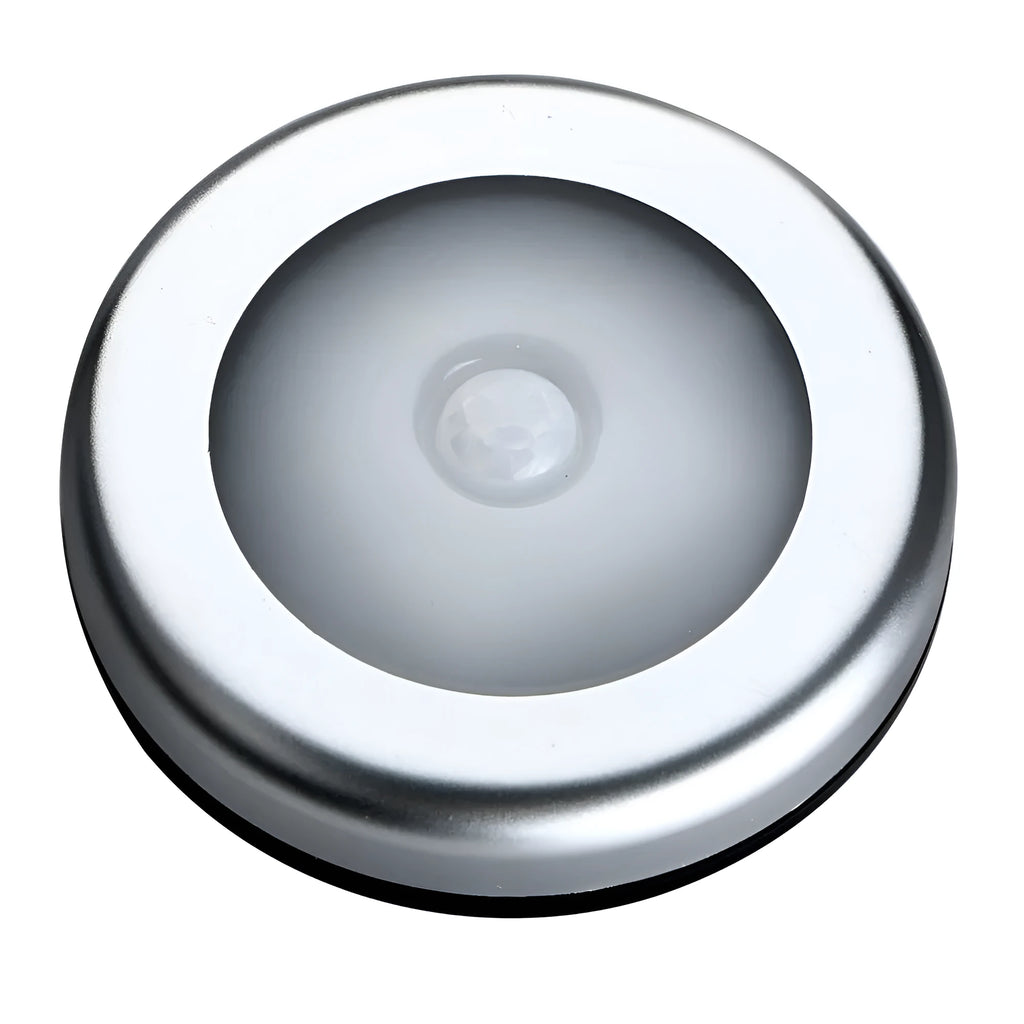 Silver square wireless motion sensor night light on a surface, showing its compact 80mm x 80mm size.