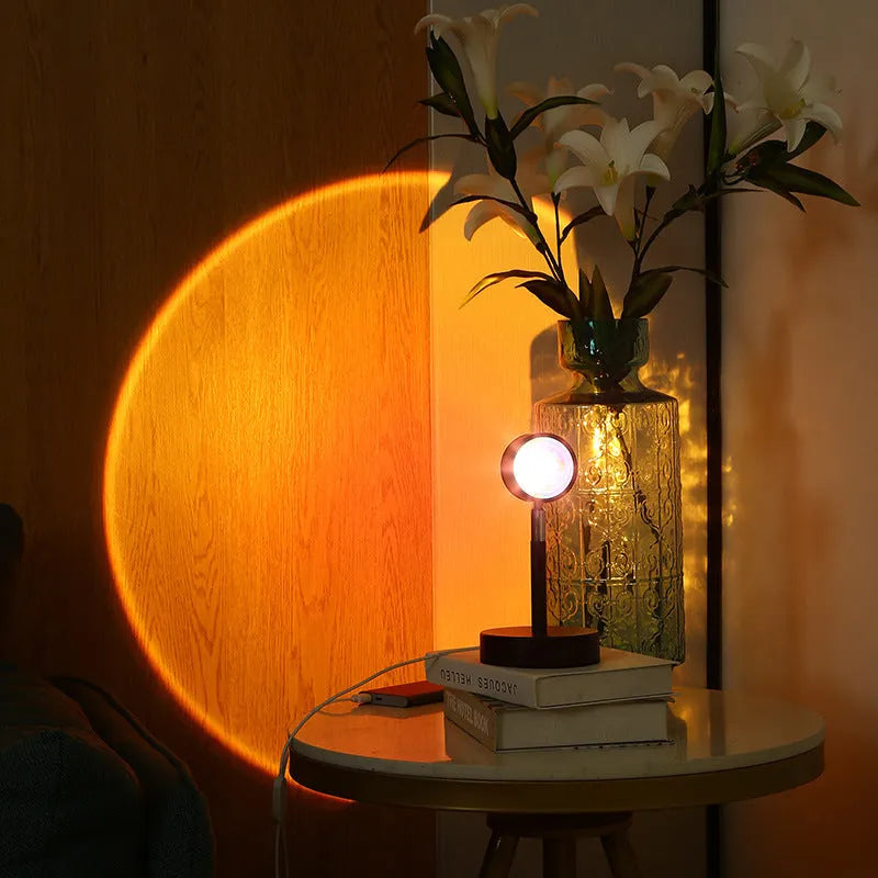 Black USB dual-head sunset rainbow projection lamp showing orange and pink colour projection