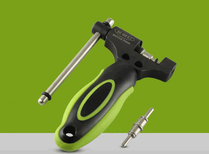 Green steel bicycle chain tool with integrated chain breaker and driver for Type 0 chains.
