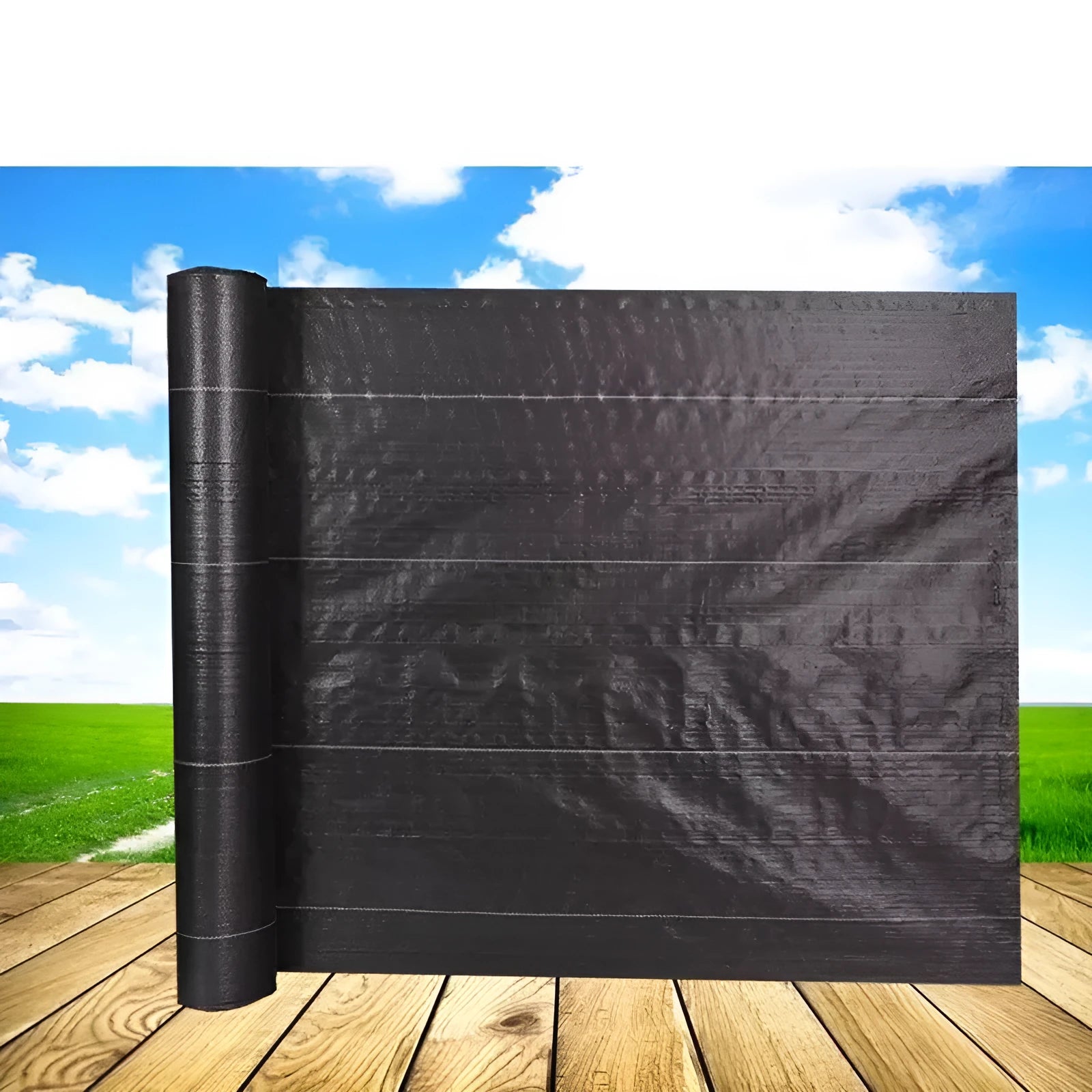 Black polyethylene woven weed proof cloth laid flat on soil, showing its texture and one of the available size options.
