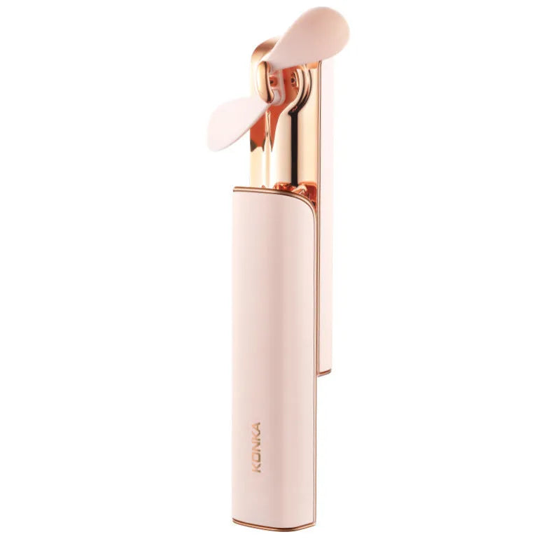 Pink folding handheld portable fan with USB cable on a white background.