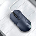 Blue smart voice translator mouse with 2.4G wireless receiver on a desk.