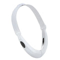 White handheld facial lifting device with LED lights for red and blue light therapy and vibration massage.