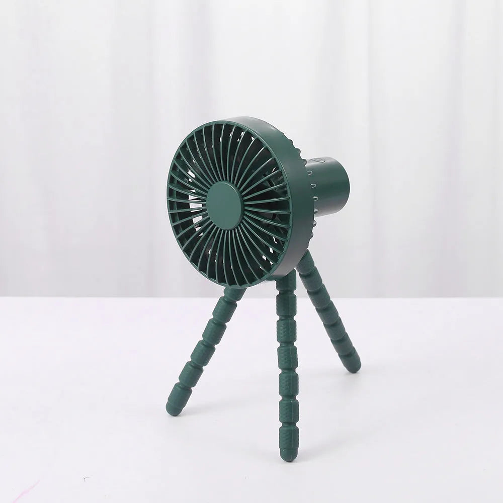 Small rechargeable desktop fan with adjustable tripod and multi-function handle, in black, green, pink, or white.