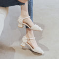 Women's apricot suede d'Orsay flat shoes with an ankle strap and low block heel.
