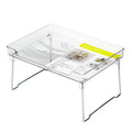 A transparent or white plastic kitchen supplies rack for organising utensils on a desktop or in a cupboard.