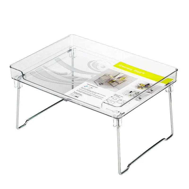 A transparent or white plastic kitchen supplies rack for organising utensils on a desktop or in a cupboard.