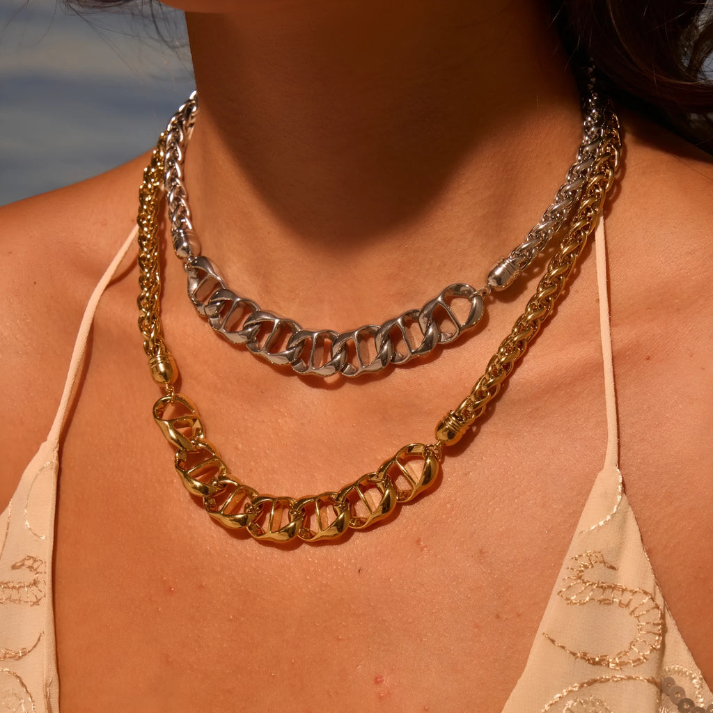 Gold plated stainless steel necklace with geometric pendant on regular chain for women