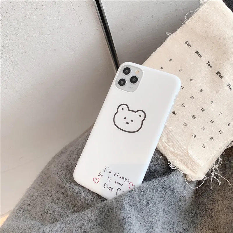 Soft silicone iPhone case with a Korean bear cartoon design on the back.
