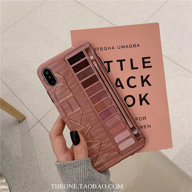 A flesh-coloured silicone case next to a grey one for various iPhone models.