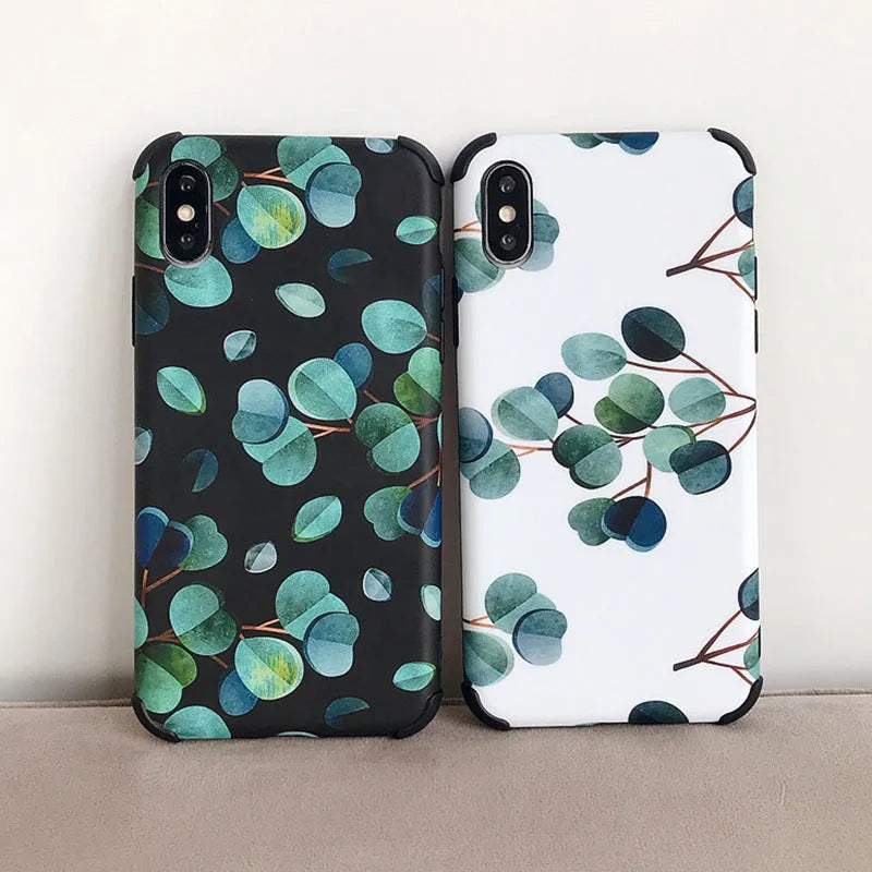 Black silicone phone case with a leaf design for various iPhone models.
