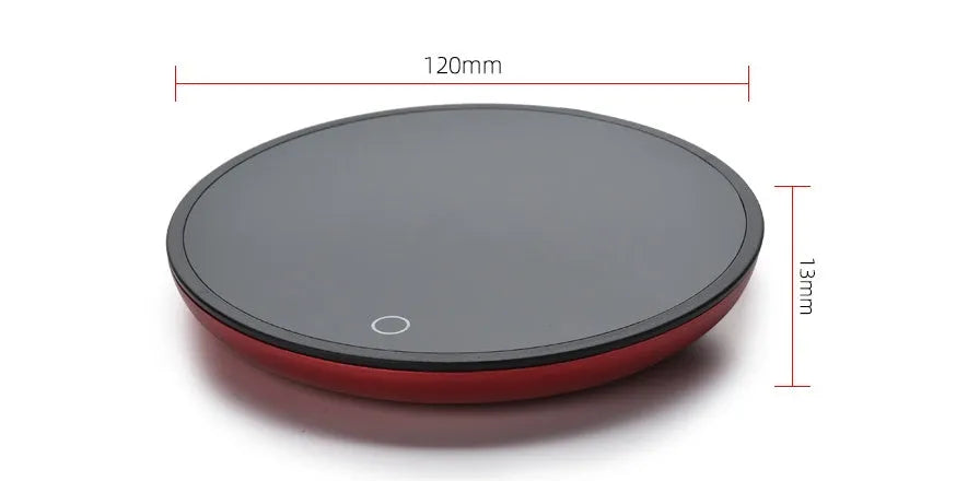 Black circular coffee cup warmer with low and high temperature switch on a desk