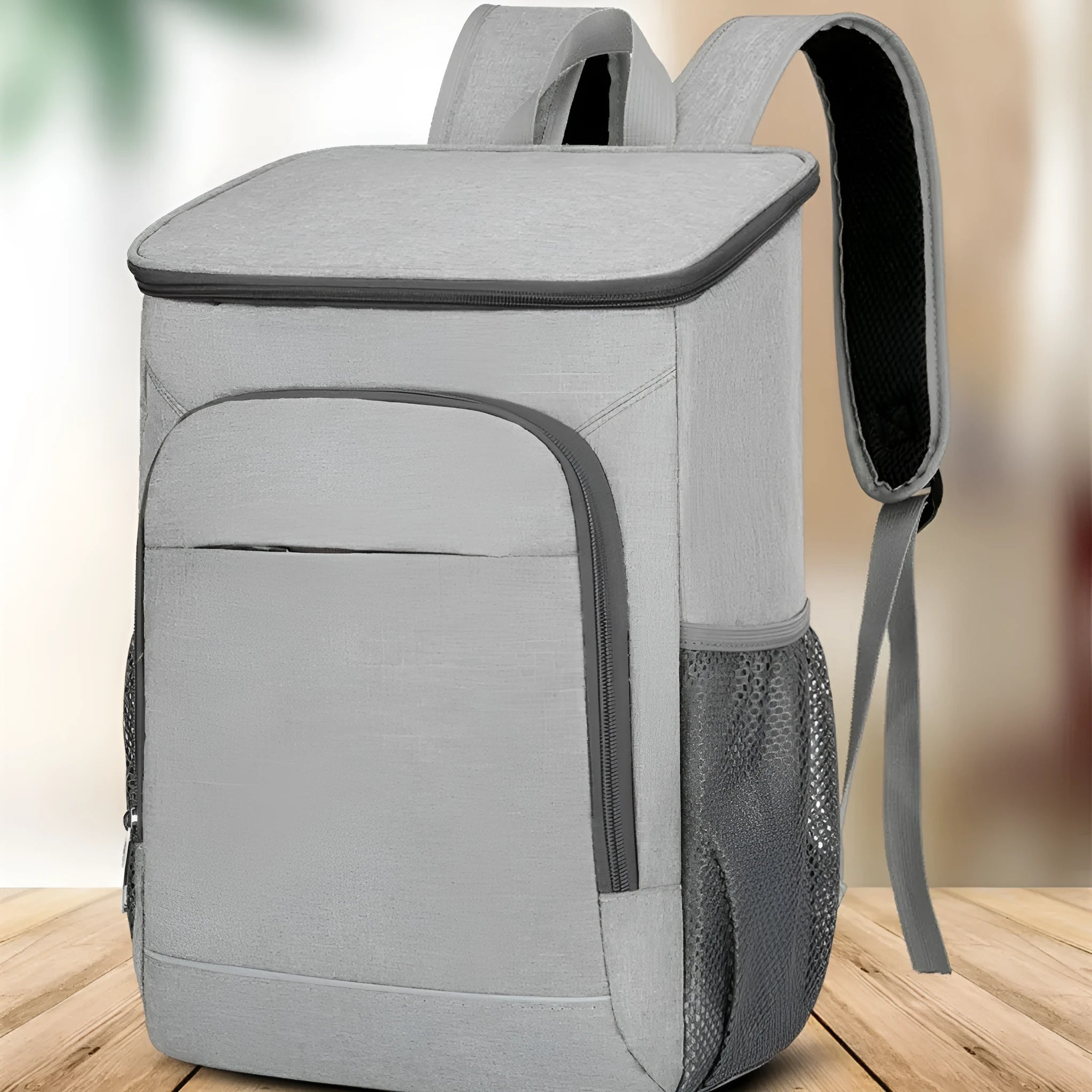 Outdoor thermal picnic backpack with curved shoulder straps in Oxford cloth construction.