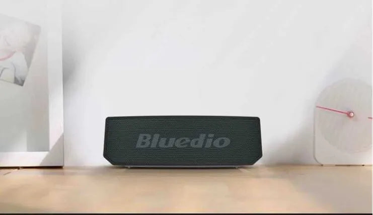 Black cloud smart speaker with compact design showing dimensions and Micro-USB charging port