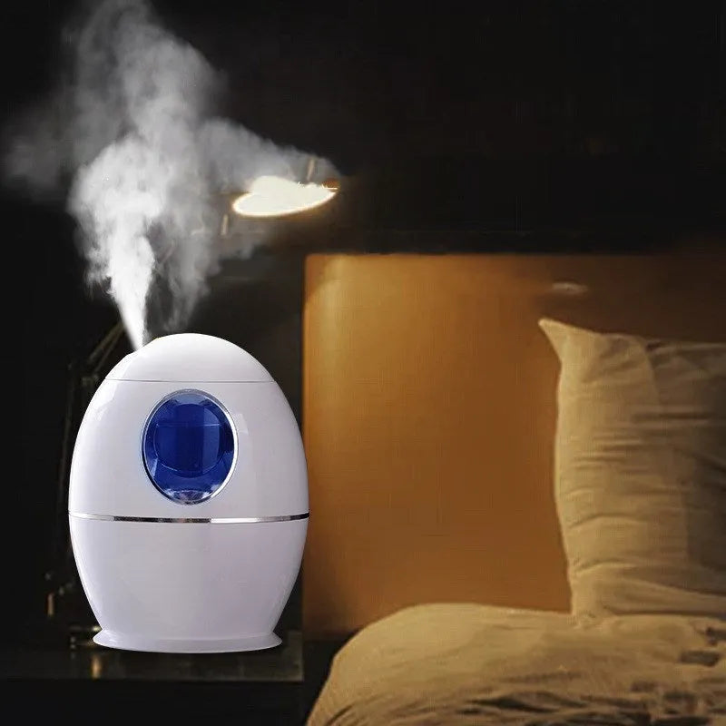 White columnar household air disinfection humidifier with USB port and mechanical controls.