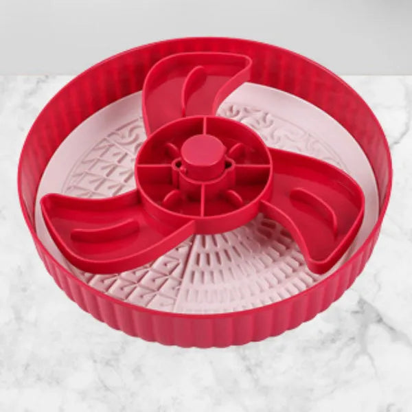 Pet slow feeder bowl with silicone licking mat in rotating game board design