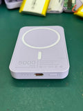 White magnetic wireless charging power bank with 5000mAh capacity measuring 100x65mm