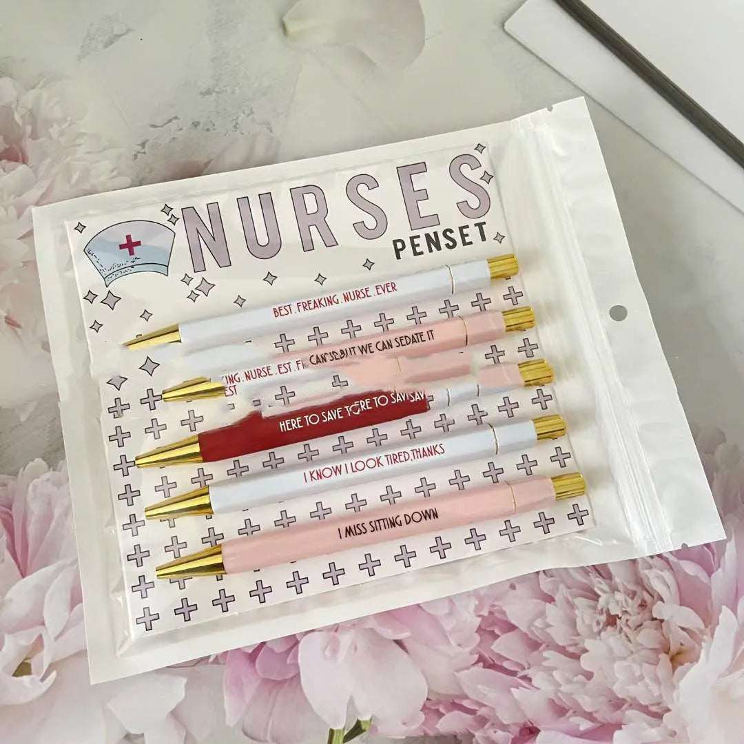 Set of five nurse-themed retractable ballpoint pens with medical text printed on plastic barrels