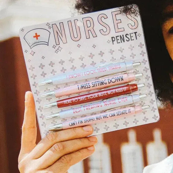 Set of five nurse-themed retractable ballpoint pens with medical text printed on plastic barrels