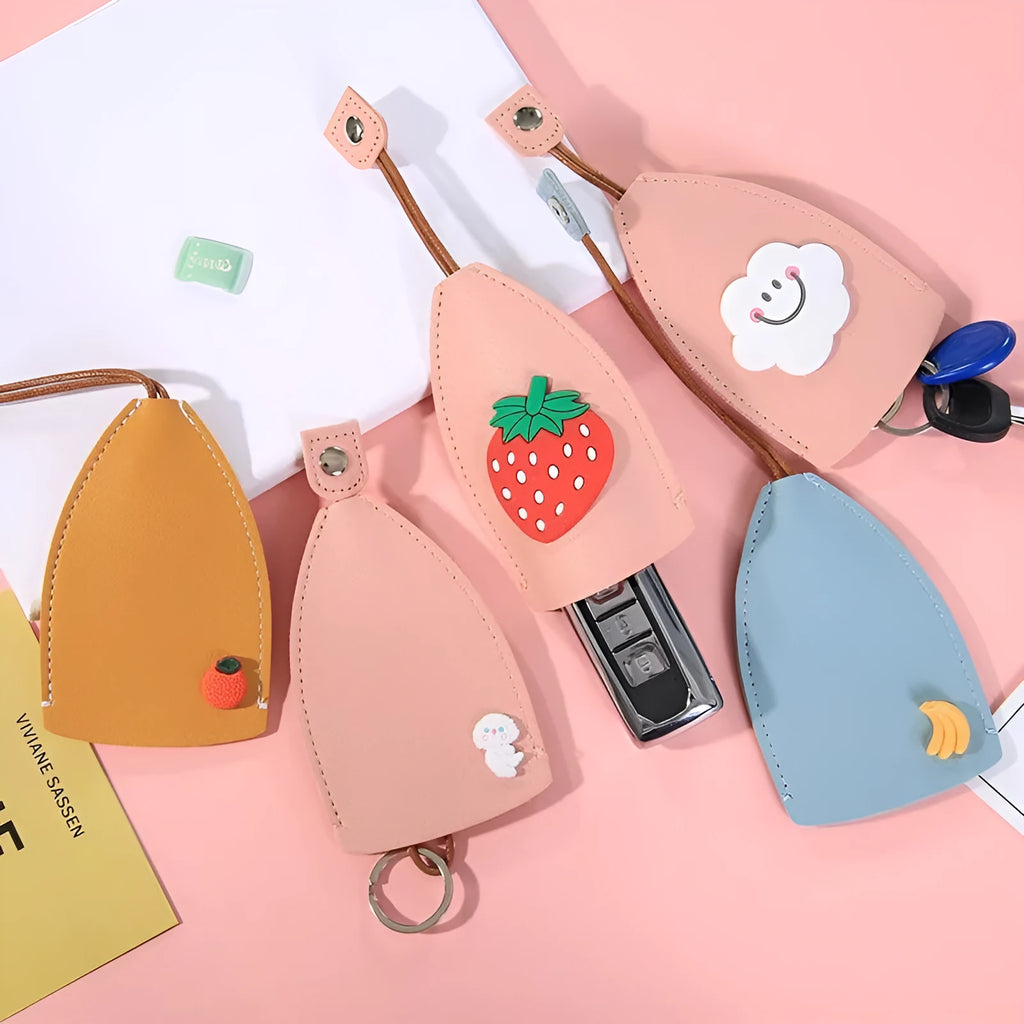 Colourful cartoon pull-out key case made from PU leather measuring approximately 14cm by 7.5cm