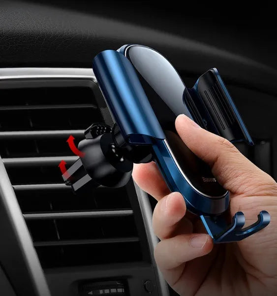 Universal car phone bracket in black, blue, and silvery colours mounted on a car dashboard