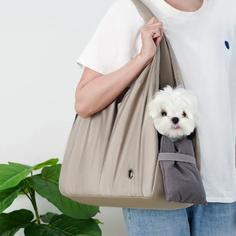 Apricot-coloured cloth pet handbag for small dogs measuring 41x16x28 cm