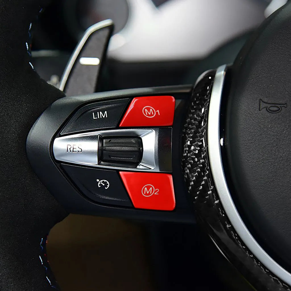 Pair of red M1 and M2 steering wheel mode button accessories for BMW cars