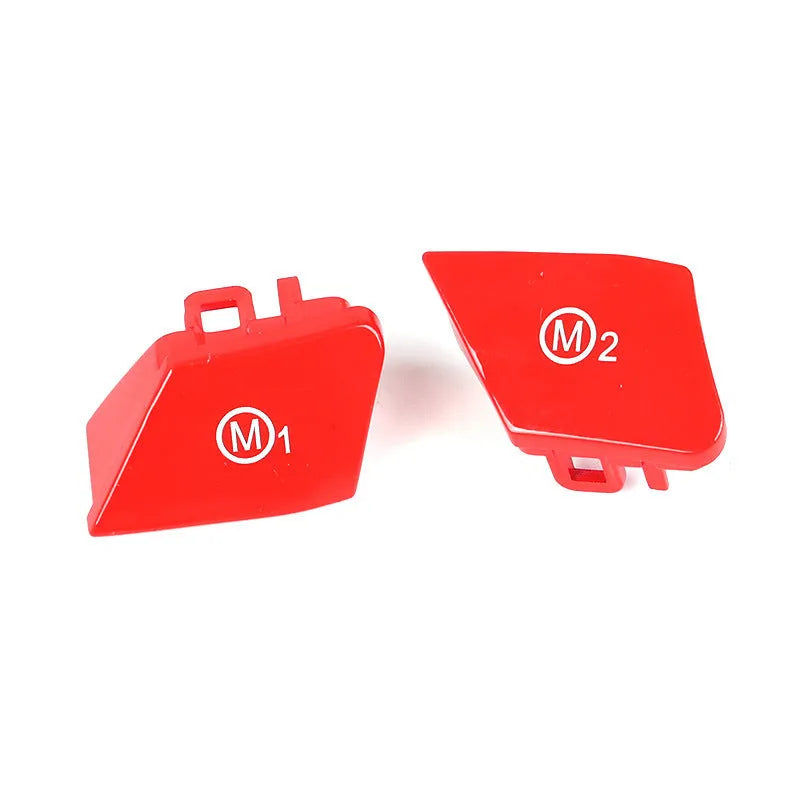 Pair of red M1 and M2 steering wheel mode button accessories for BMW cars