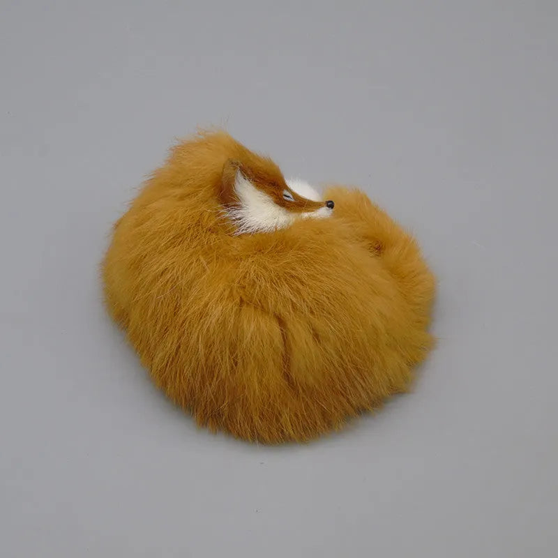 Artificial white fox fur car decoration measuring 15cm long with yellow and red colour options