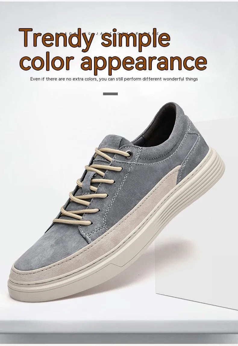 Men's grey casual skate shoes made of pigskin leather with a rubber sole and front lace-up.