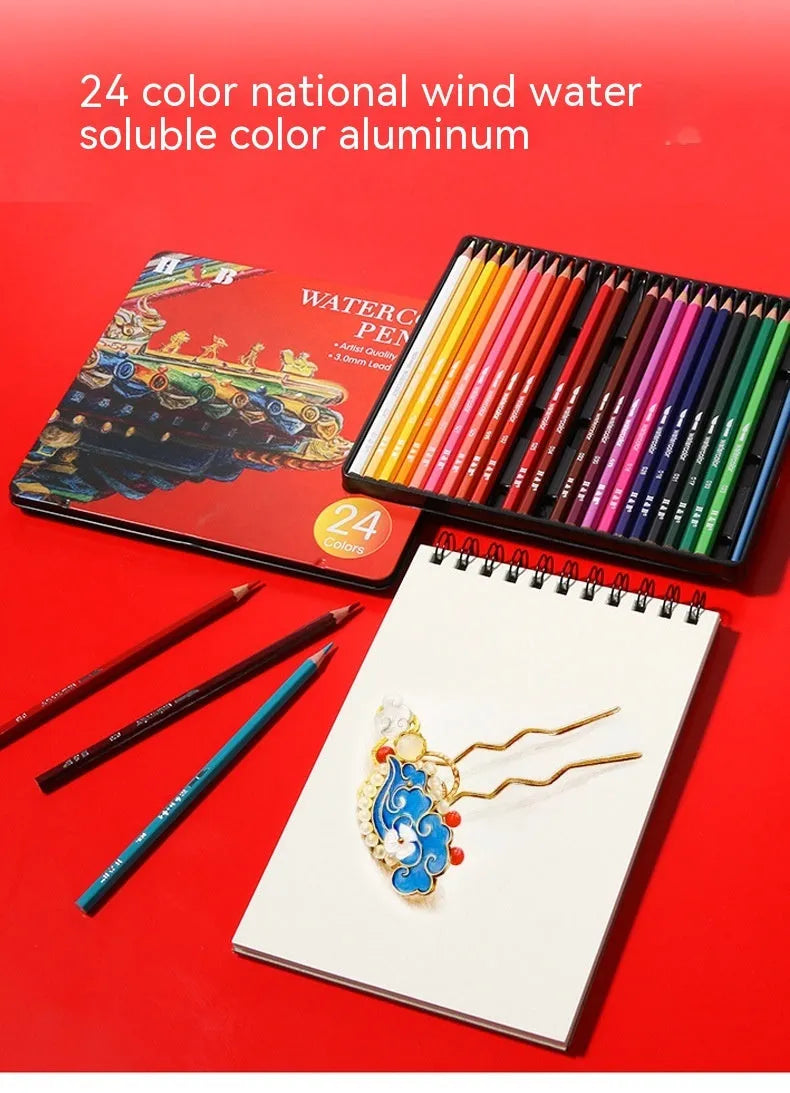 Box of 24 water soluble coloured pencils open inside a silver iron storage tin.