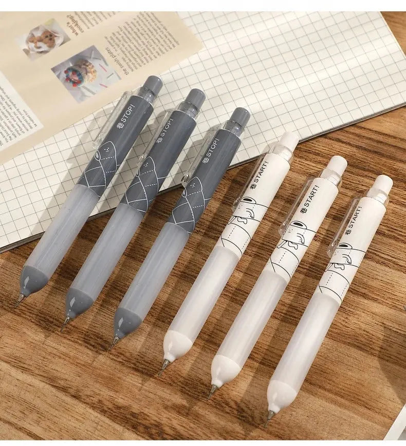 Black and white 0.5mm mechanical pencils with cloud grip design on a minimalist background