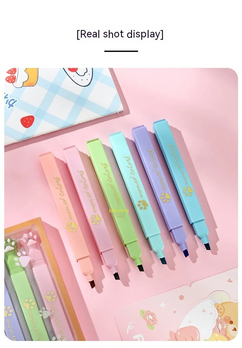 Cat's Paw fluorescent marking pen set showing six coloured pens with oblique nibs in a plastic case.