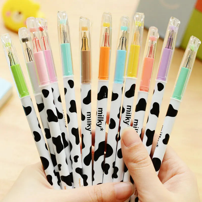Pack of 12 cow print gel pens with 0.38mm fine tips in assorted colours