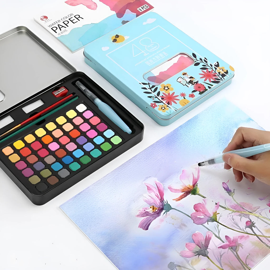 48 colour solid watercolour paint set in box showing Black Knight, Girl Pink and Sunshine Blue pans